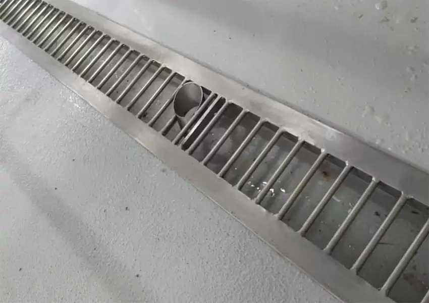 Desagüe piso de zona de lavado